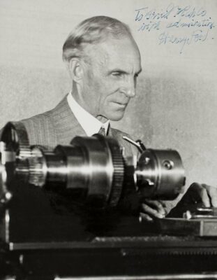 Ford Motor Founder Henry Ford shows lathe